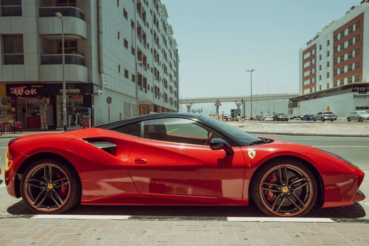 Scenic drive in a Ferrari rental along Dubai coast